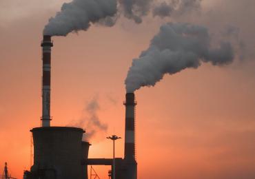 Energy plant with pollution pouring out of two chimneys in China