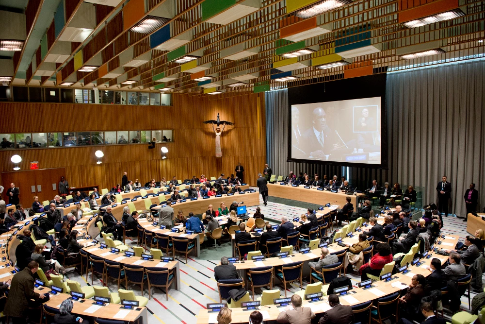 UN Trusteeship Council in session with delegates in a spherical seating layout